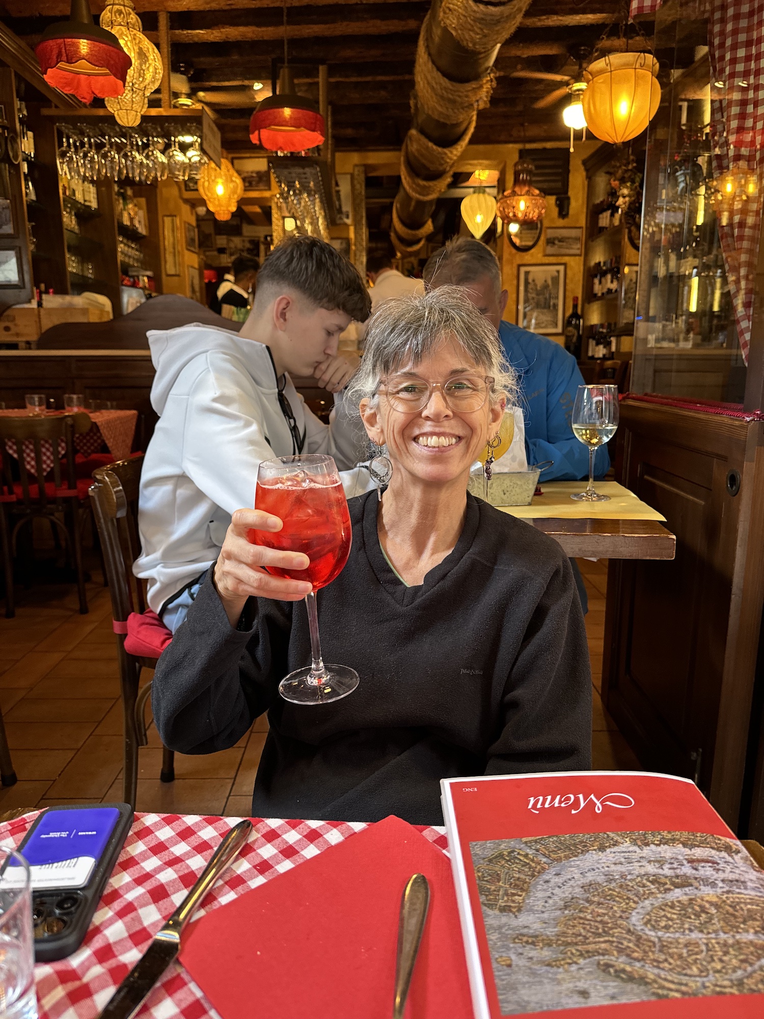 Nancy enjoying an Aperol Spritz.